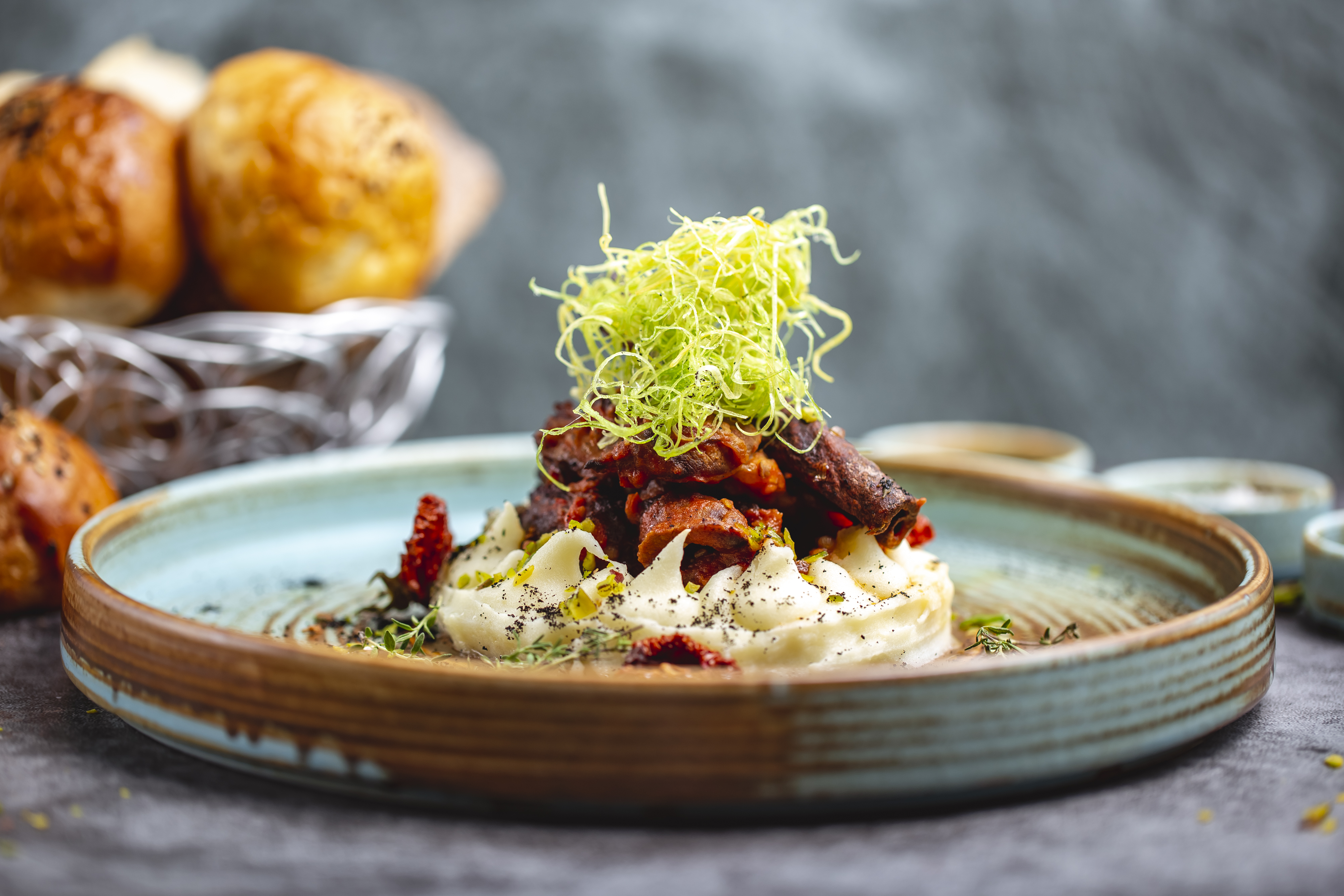 Premium meat with mashed potato and herbs